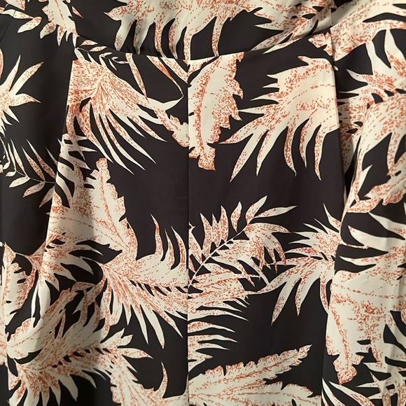 Chic Black and Cream Wide-Leg Jumpsuit - Picture 4 of 9